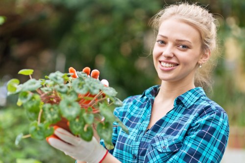Professional landscaper enhancing garden curb appeal in Enfield